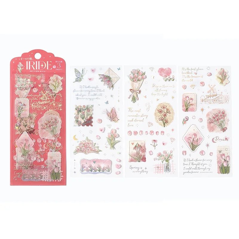 Clear stickers IRIDE 3-pack - Language of Flowers från BGM. Förpackning och tre ark med klistermärken. Klistermärkena är rosa blommor. - Tidformera