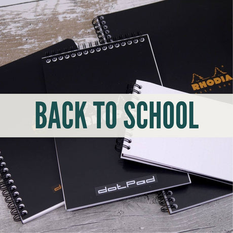 Text med Back to School över spiralblock från Rhodia. Tidformera