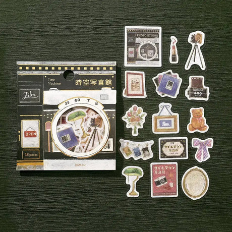 Förpackning med klistermärken. Stickers utspridda. Film och kort. Flake stickers - Fantasy Shopping Arcade - Time and Space Photo Gallery från BGM - Tidformera