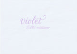 Handskriven text med orden "violet" och "ZEBRA mildliner" i violett färg, skriven med Zebra Mildliner Brush Pen i färgen Violet.