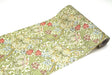 Utdragen rulle med mt Casa Fleece - Morris & Co - Golden Lily från MT masking tape. Mönstret ärgröna växter med inslag av röda och blåa blommor. - Tidformera
