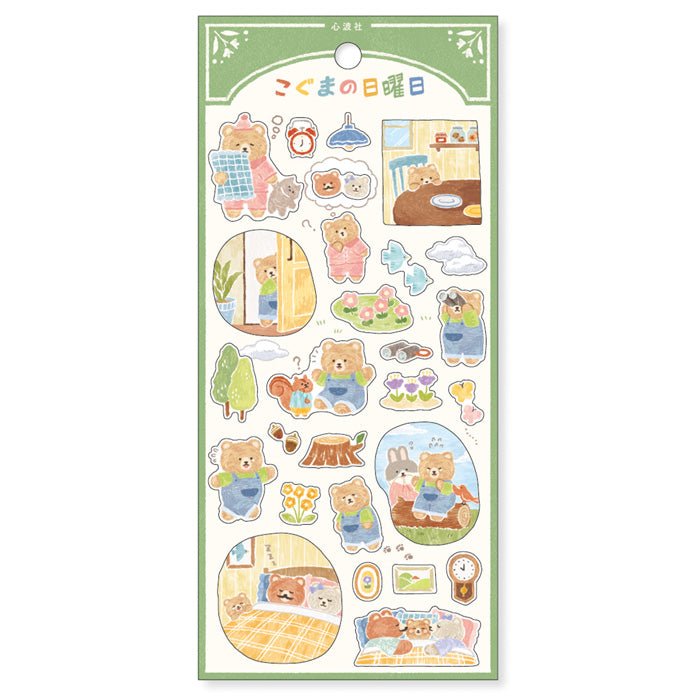 Picture Book Sticker - Koguma Sunday från Mind Wave. Ett ark med klistermärken där motivet är en björn i vardagsbestyr.  - Tidformera
