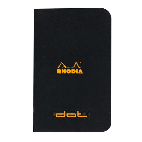 Rhodia Skrivhäften - A7 Dotted från Rhodia - Svart skrivhäfte som det i orange skrift står Rhodia och Dot på. - Tidformera