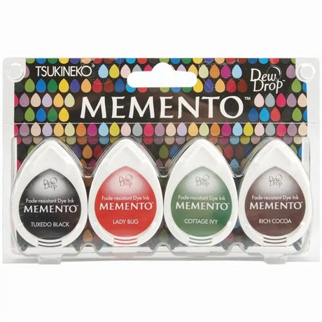 Stämpeldyna Memento Dew Drop - Gotta Have från Tsukineko. 4 stämpeldynor  med färgerna svart, röd, grön och brun i en förpackning.  - Tidformera