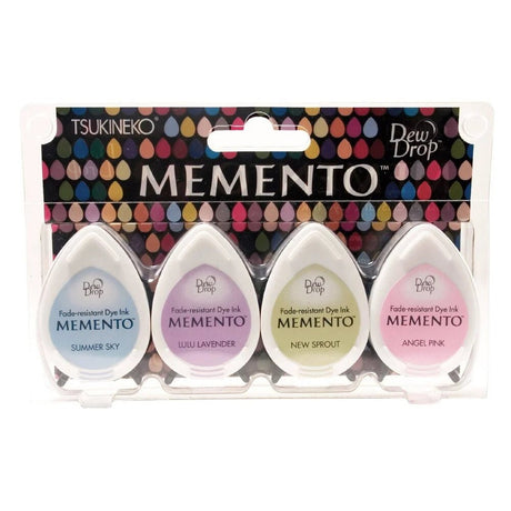 Stämpeldyna Memento Dew Drop - Oh Baby från Tsukineko.  4 ljusa färger på stämpeldynor i denna förpacknig. Blå, lavendel, grön och rosa. - Tidformera