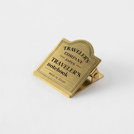 TN Brass Clip 030. TRC Logo - 2 - Traveler's Company - Tidformera